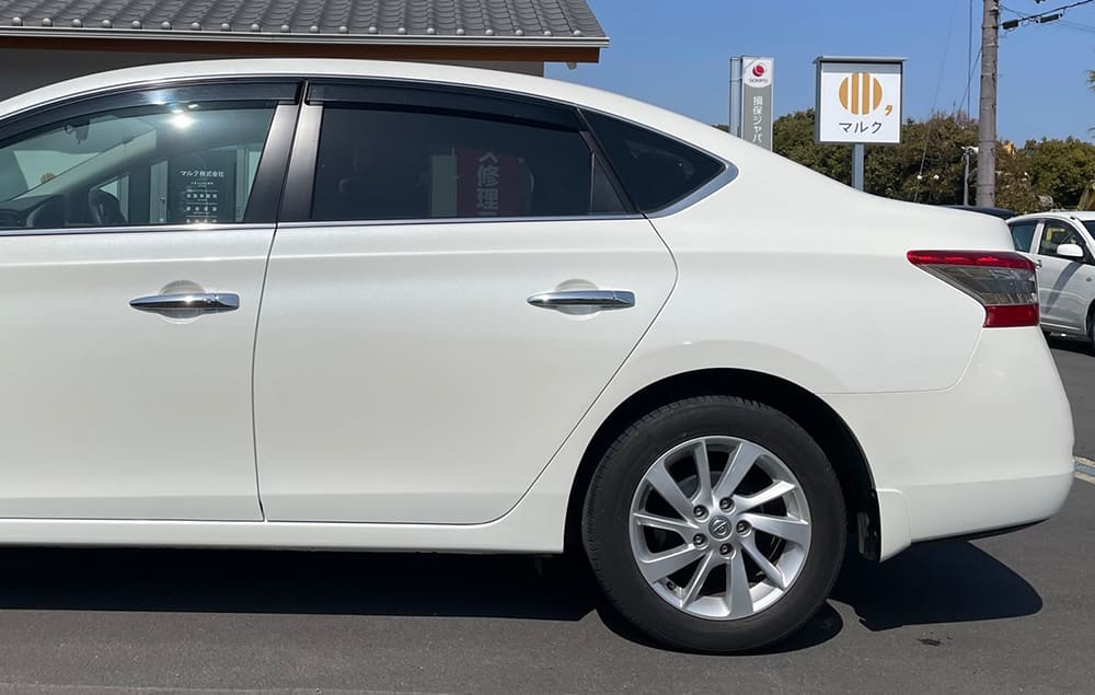 「施工後」日産 シルフィーの左前後ドア・クォーター・リヤバンパーの修理(高市郡明日香村のお客様)