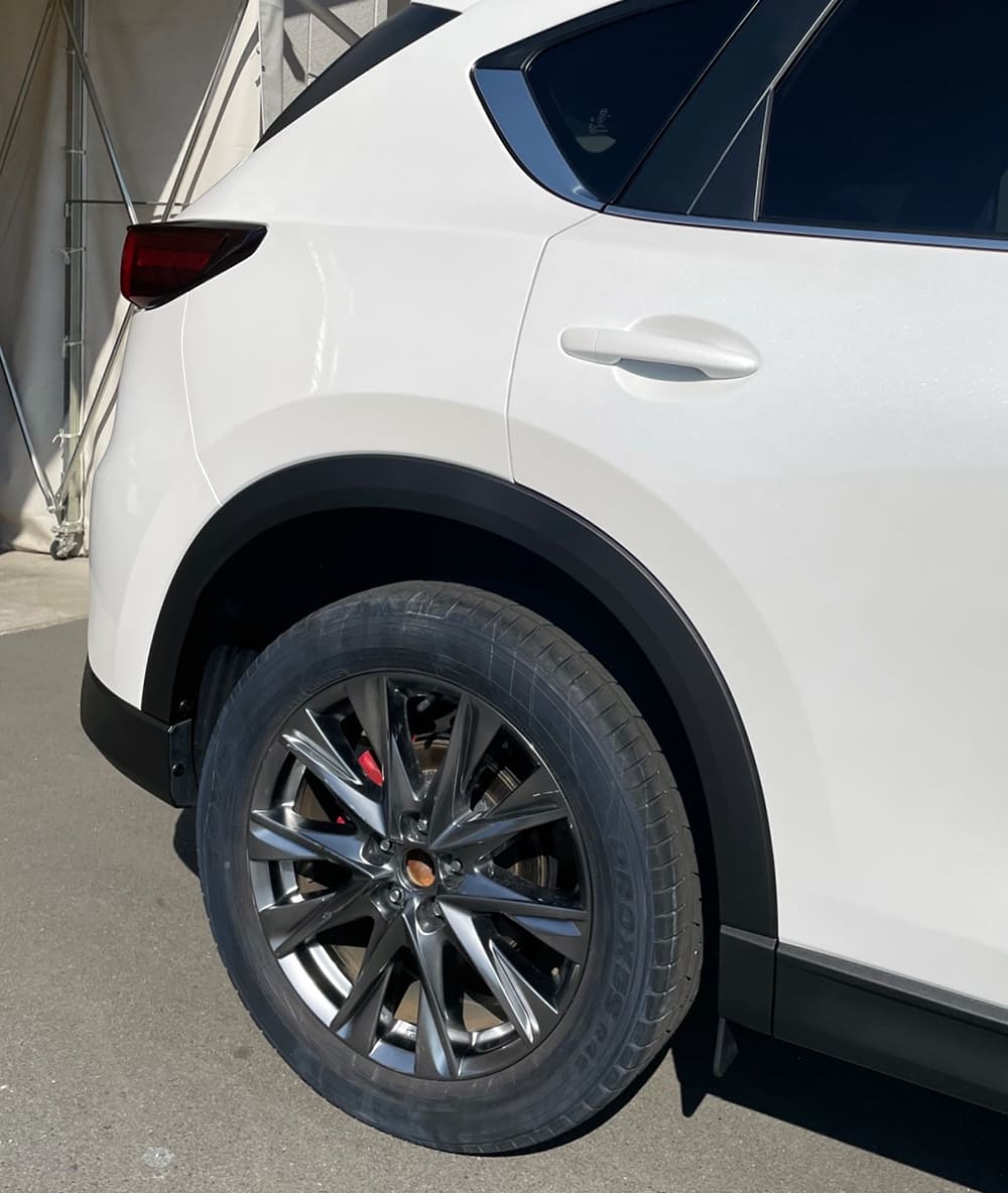 「施工後」マツダCX-5の右リヤドア・クォーター・タイヤハウス・リヤバンパーの修理（奈良県桜井市のお客様）